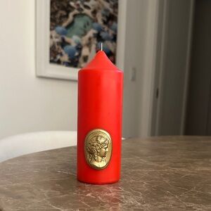 Cire Trudon Red Candle with Gold Emblem